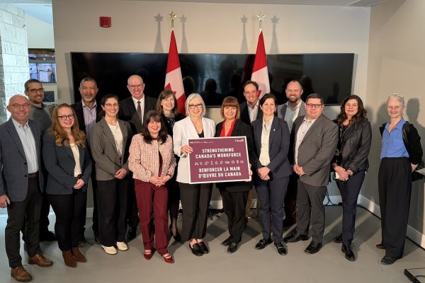 Photograph of the Honourable Patty Hajdu and a group of business leaders at an announcement.