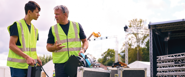 Two Concert Organizers Working on the Stage-01