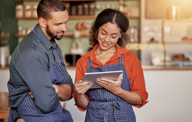 Restaurant Cafe Teamwork And Couple With Tablet To Manage Orders